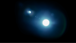 Free Blue Moon lens flare effect overlay with black background