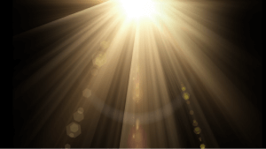 Free Charm Above lens flare effect overlay with black background